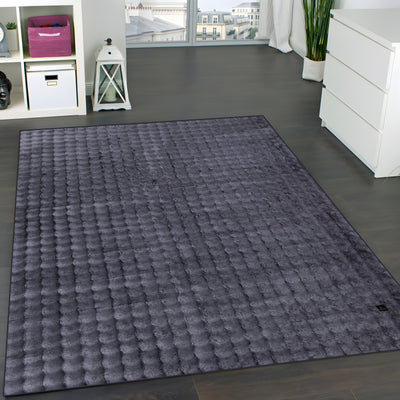 dark grey velvet pile carpet