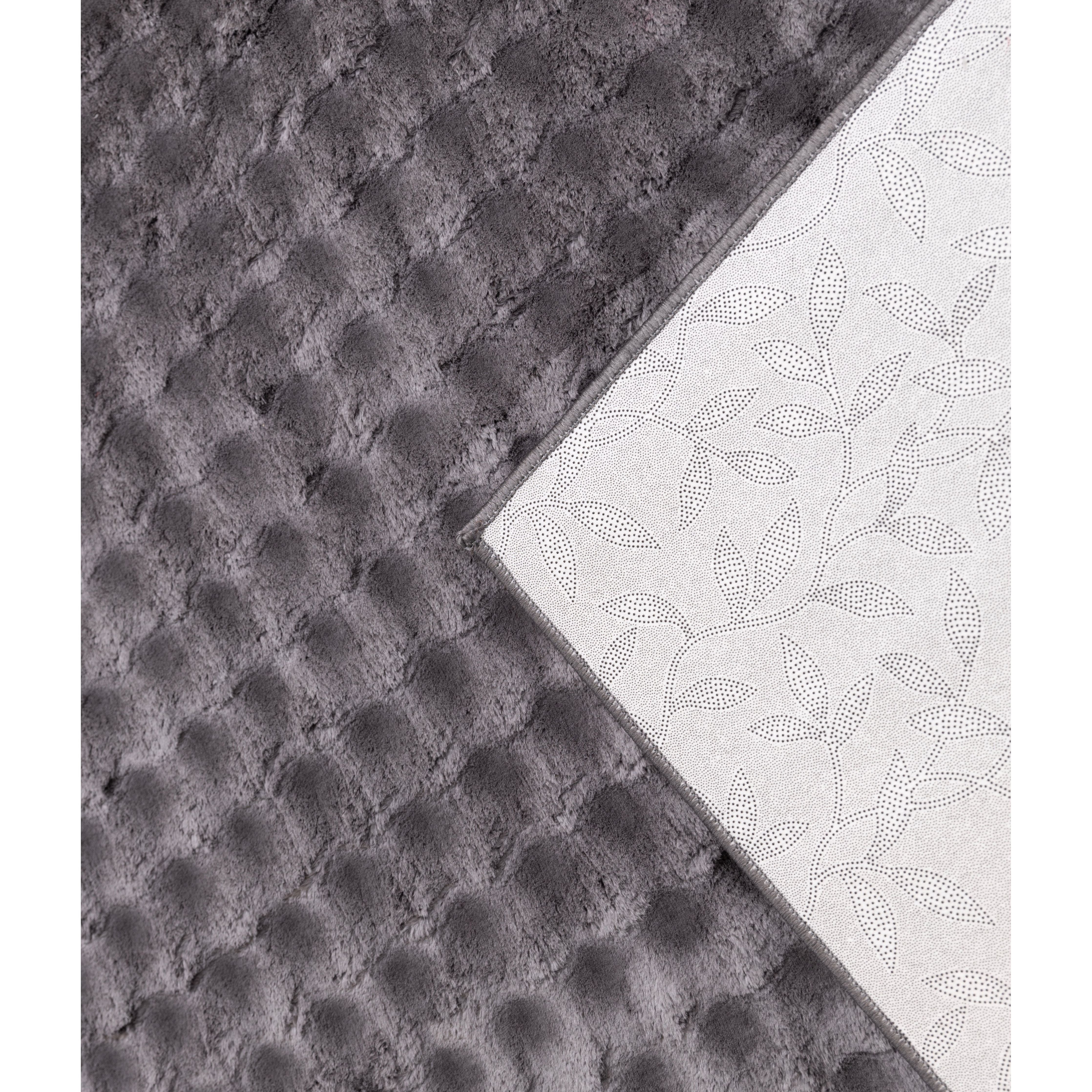 dark grey velvet pile carpet